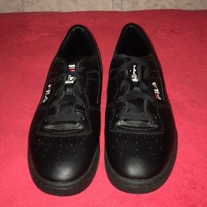 black ,red and white Fila’s